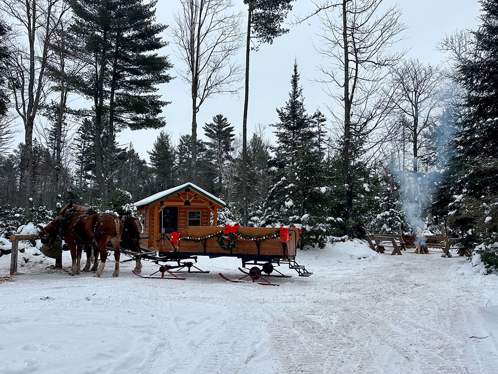 Warming fire on a Haven Pines sleigh ride